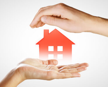 hands-holding-digital-house-icon-on-white-backgrou-2025-10-15-05-03-10-utc